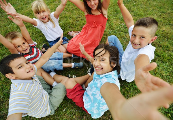 [[stock_photo]]: Groupe · heureux · enfants · été · herbe · prairie