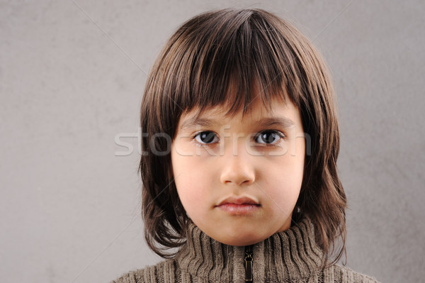 Stock photo: Schoolboy, series of clever kid 6-7 years old with facial expressions