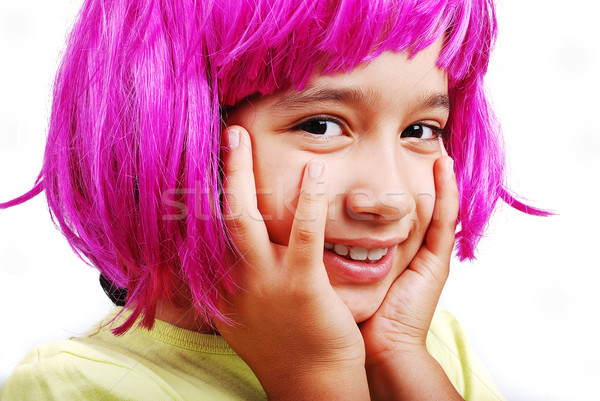Adorable girl with pink hair and facial gesture Stock photo © zurijeta