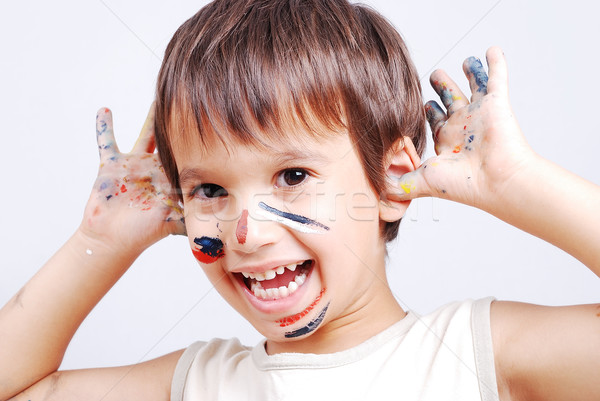 Kicsi aranyos gyerek színek arc kezek Stock fotó © zurijeta