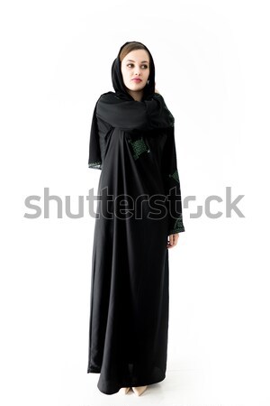 Arabic Muslim girl wearing black robe over white background posi Stock photo © zurijeta