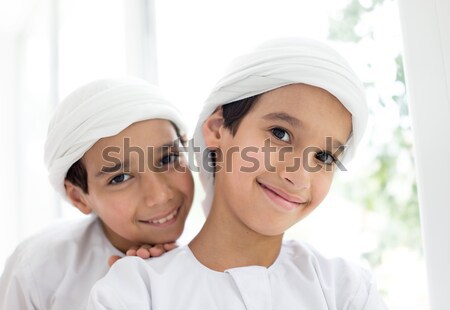 Happy Arabic father and son Stock photo © zurijeta