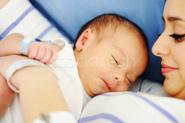 Middle eastern woman with her baby at hospital ro Stock photo © zurijeta
