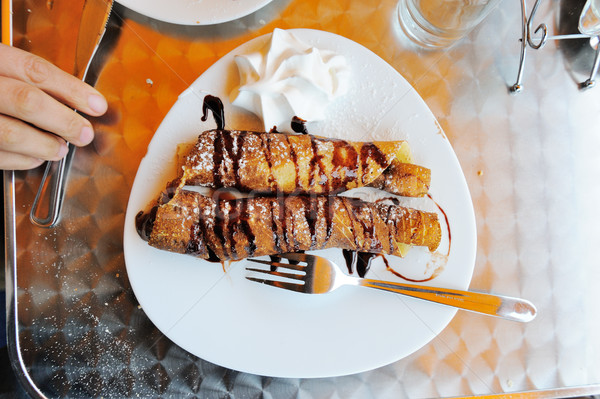 Delicious pancake with chocolate syrup Stock photo © zurijeta
