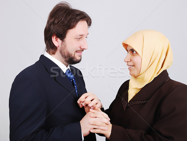 Young muslim couple looking at each other Stock photo © zurijeta