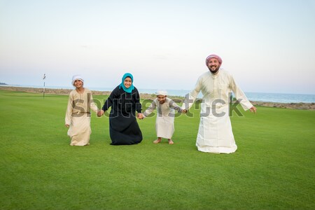 Happy Arabic family on summer vacation Stock photo © zurijeta