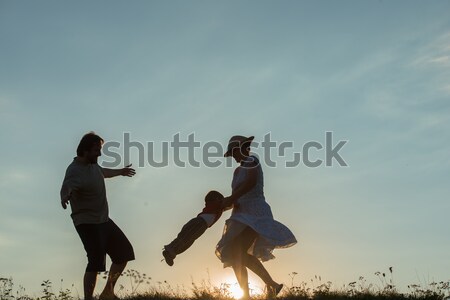 Dwa dzieci mężczyzna kobiet stałego słońce Zdjęcia stock © zurijeta