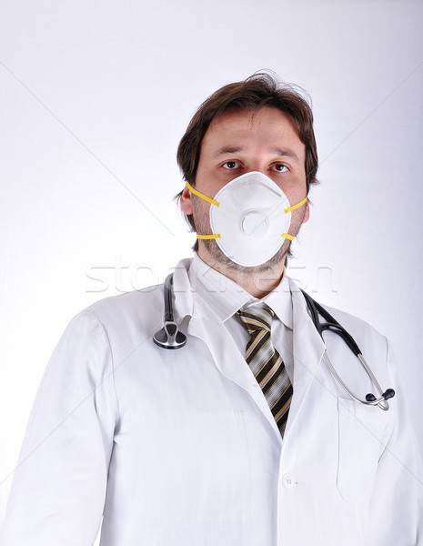 Young attractive male doctor in characteristic clothes Stock photo © zurijeta