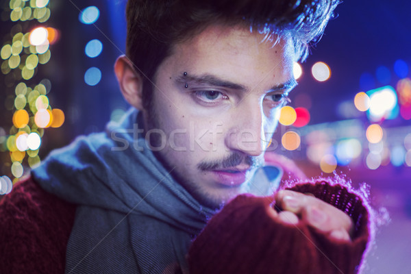 Young people on the night city street freezing of cold Stock photo © zurijeta