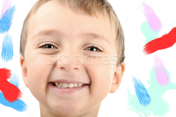Happy boy smiling, colors around, isolated Stock photo © zurijeta