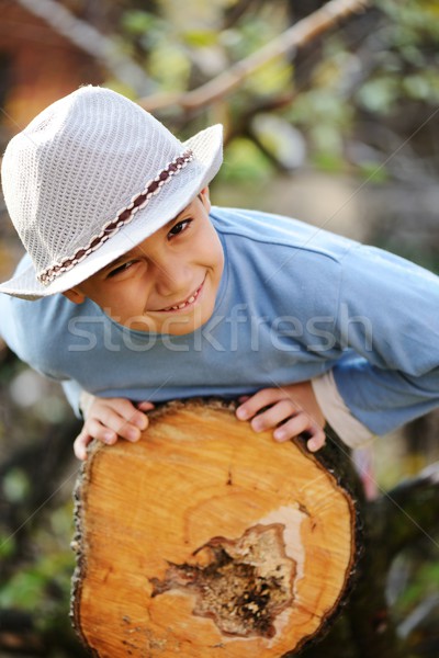 Boy portrait on tree outdoor in nature Stock photo © zurijeta