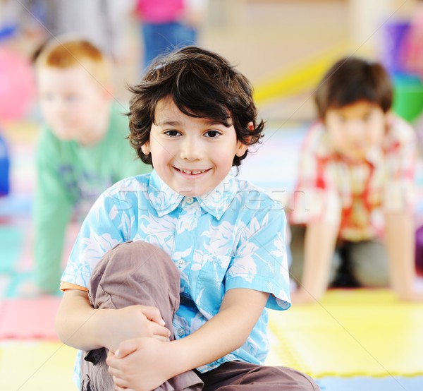 Kids playing on colorful kindergarden playground Stock photo © zurijeta