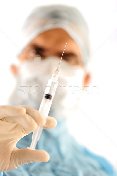 Orvos tart injekció férfi munka egészség Stock fotó © zurijeta