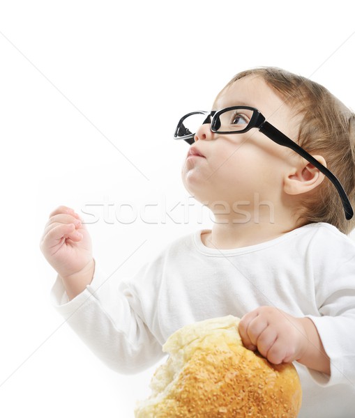 Baby eating bun bread Stock photo © zurijeta