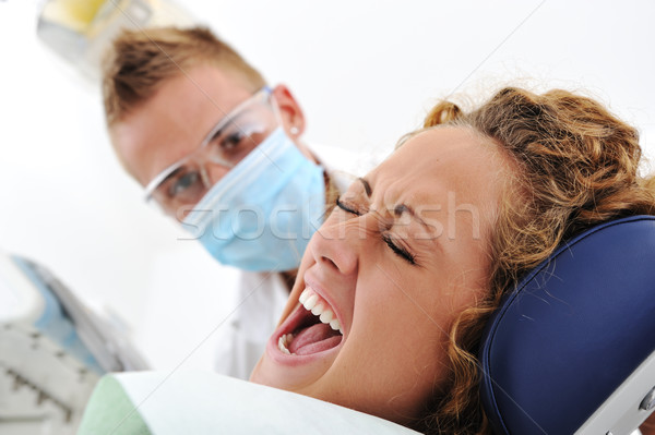 Healthy teeth patient at dentist office dental caries prevention Stock photo © zurijeta