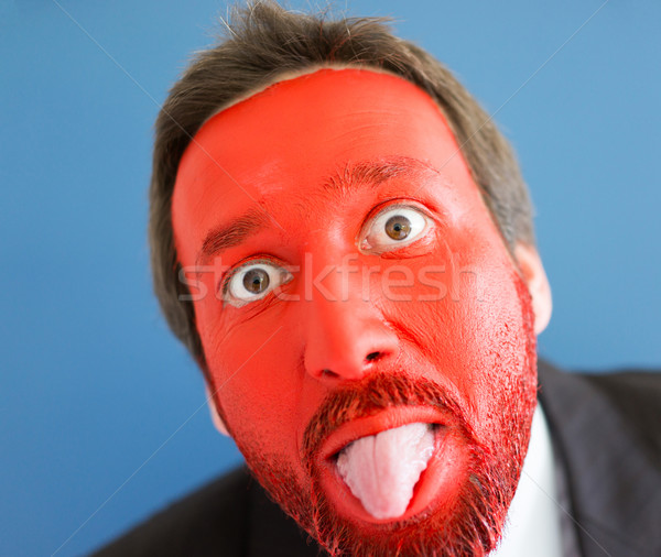 Joven rojo pintado cara espacio de la copia sonrisa Foto stock © zurijeta