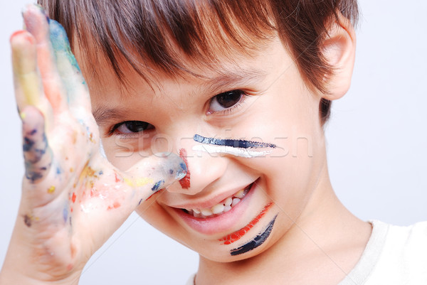 Little cute kid with colors on his face Stock photo © zurijeta