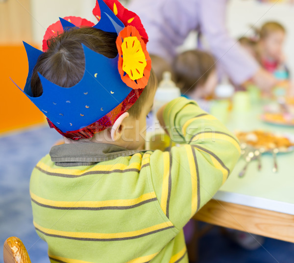 Little cute boy having birthday party at kindergarden Stock photo © zurijeta