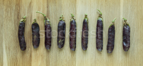 fresh ripen peas isolated on wooden background Stock photo © Zuzuan