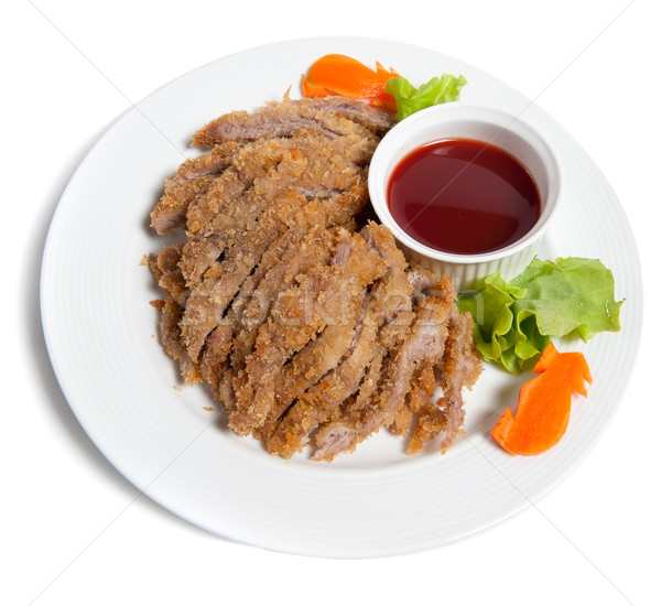 Battered pork with sauce on a plate Stock photo © zybr78