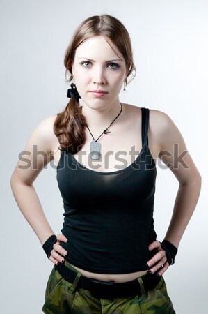 The girl in a military uniform Stock photo © zybr78